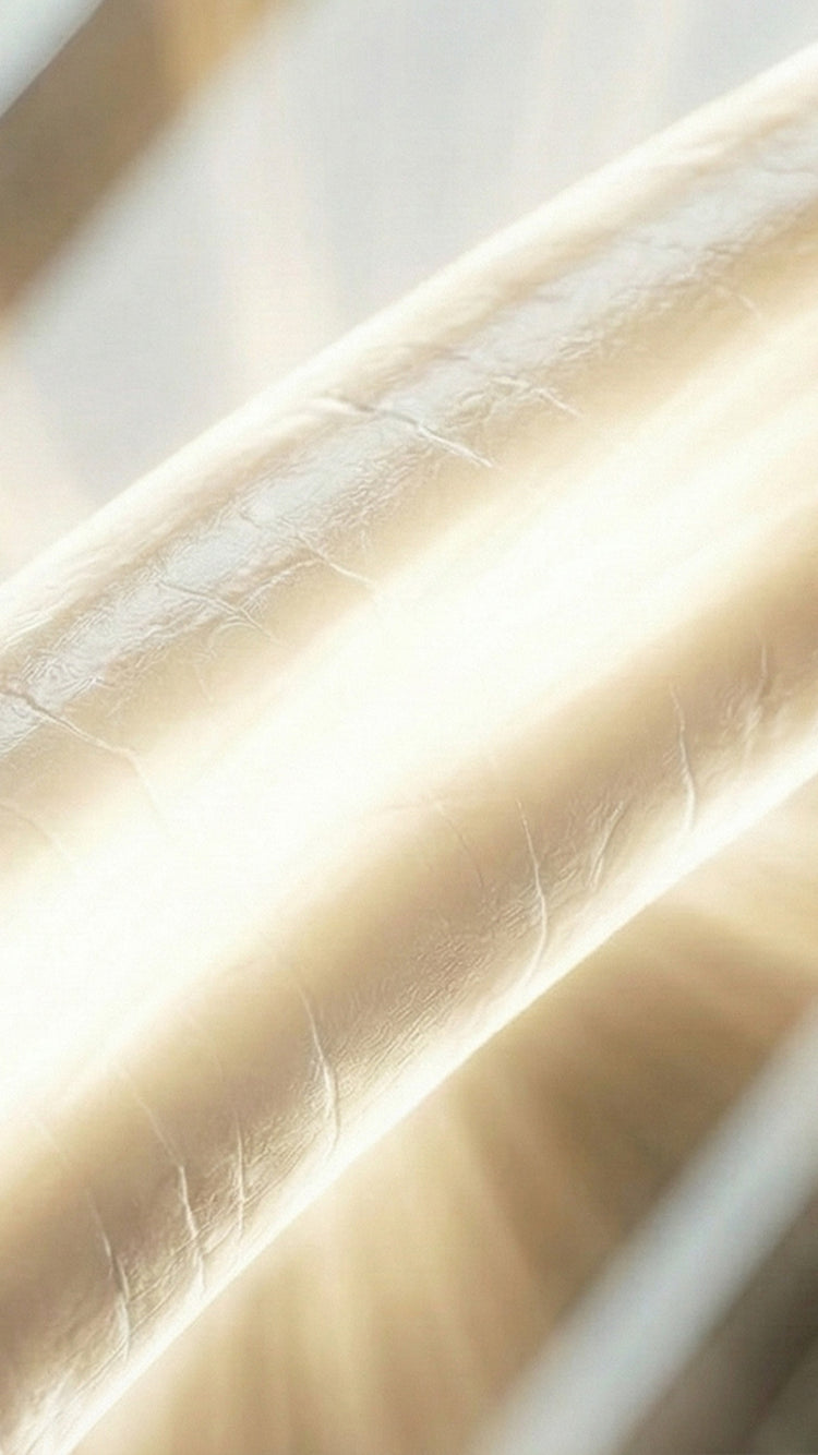 Light is reflected with increased intensity, creating a high-gloss, illuminated finish.